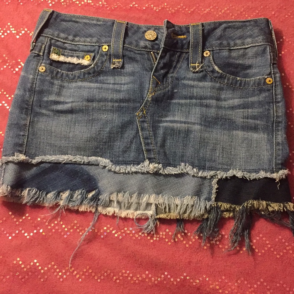 Cute fringed and frayed True Religion mini skirt.
